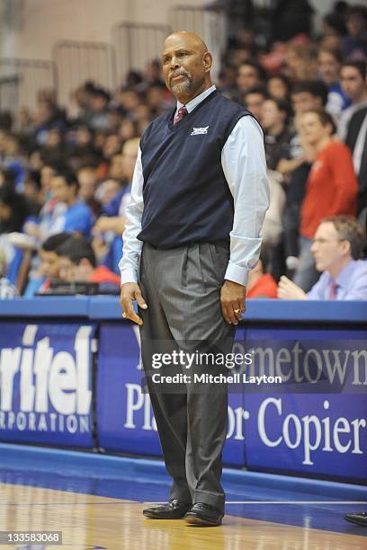 Head coach Mike Jarvis of the Florida Atlantic Owls looks on during a college basketball game against the American Eagles at the Bender Arena on...