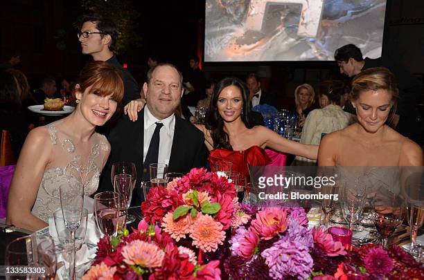 Actress Michelle Monaghan, from left, Harvey Weinstein, co-chairman and founder of Weinstein Co., Georgina Chapman, co-founder of Marchesa, and model...