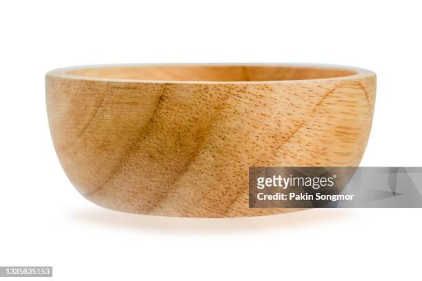 wooden bowl isolated on white background. - salad bowl stock pictures, royalty-free photos & images