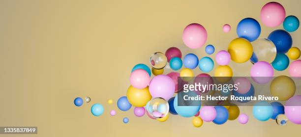 3d render of many colored spheres in yellow background, abstract geometry - 球体　cg ストックフォトと画像