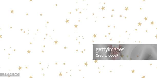 golden star seamless pattern on white background - christmas wrapping paper gold stock illustrations