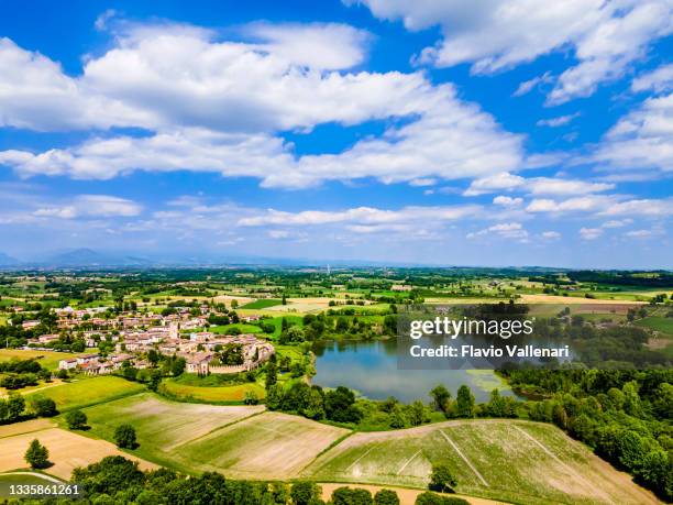 castellaro lagusello and its lake, lombardy, italy - lombard stock pictures, royalty-free photos & images