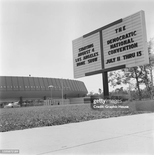 Roadside sign advertising the 1960 'Democratic National Convention, July 11 thru 15' with the venue, the Los Angeles Memorial Sports Arena, in the...