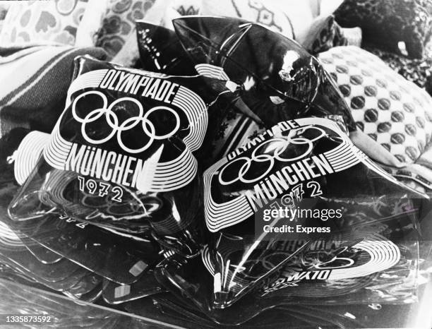 'Olympiade Munchen 1972,' inflatable cushions, examples some of the merchandise available at the 1972 Summer Olympics in Munich, Germany, 2nd...