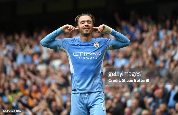 Jack Grealish of Manchester City celebrates after scoring during the Premier League match between Manchester City and Norwich City at Etihad Stadium...