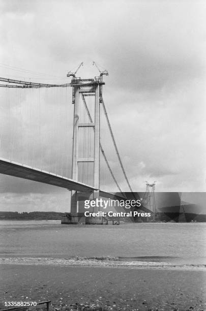 The Humber Bridge nears completion, spanning the Humber, an estuary formed by the rivers Trent and Ouse, near Kingston-upon-Hull in the East Riding...
