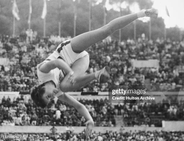 British athlete Dorothy Shirley in action during the final of the women's high jump event at the 1960 Summer Olympics, at the Stadio Olimpico in...