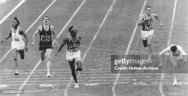 Indian athlete Milkha Singh , South African athlete Malcolm Spence , American athlete Otis Davis, American athlete Earl Young, and German athlete...