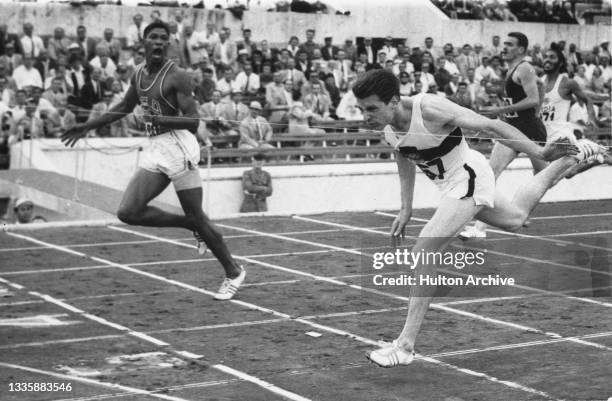 American athlete Otis Davis and German athlete Carl Kaufmann in the final of the men's 400-metres event at the 1960 Summer Olympics, at the Stadio...