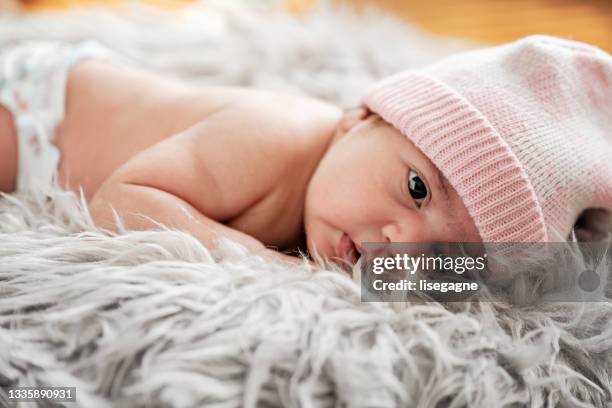 new born baby girl - beautiful arab girl stock pictures, royalty-free photos & images