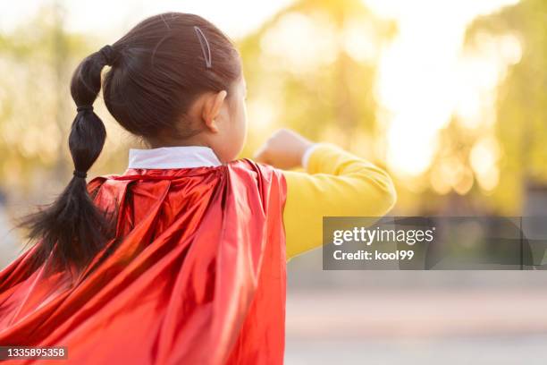 supergirl good posture - attitude youthful asian stockfoto's en -beelden