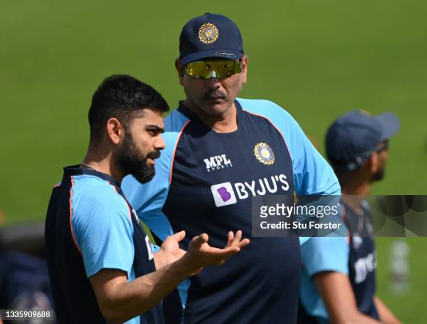 India captain Virat Kohli chats with Head Coach Ravi Shastri during India nets ahead of the Third Test Match against England at Emerald Headingley...