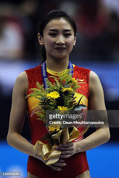 Wenna He of China celebrates winning gold in the Individual Trampoline Womens Final during the 28th Trampoline and Tumbling World Championships at...