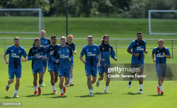 Players seen L-R Paul Dummett, Dwight Gayle, Sean Longstaff, Jacob Murphy, Emil Krafth, Matty Longstaff, Ciaran Clark, Jeff Hendrick, Jamaal...