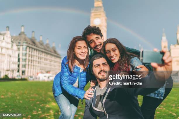 friends enjoying london together - big ben selfie stock pictures, royalty-free photos & images