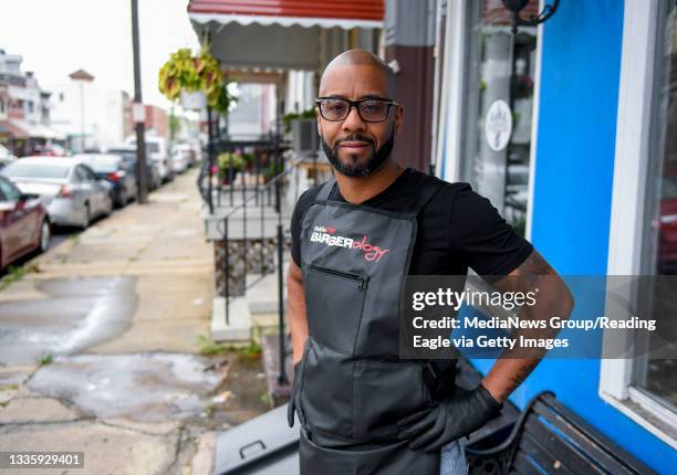 Reading, PA Samuel Delacruz, the owner of Double Platinum Barbershop on North 9th street in Reading, PA at his shop Thursday morning August 19, 2021....