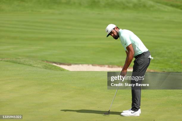 Tony Finau of the United States putts on the first green during the final round of THE NORTHERN TRUST, the first event of the FedExCup Playoffs, at...