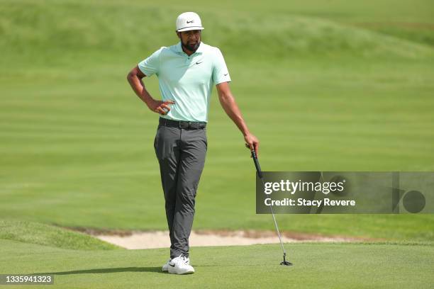 Tony Finau of the United States waits to putt on the first green during the final round of THE NORTHERN TRUST, the first event of the FedExCup...