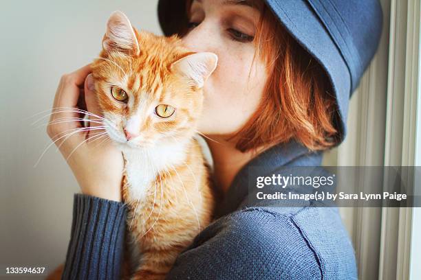 orange-cat-girl.jpg?s=170667a&