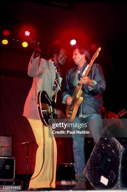 British musician Keith Richards performs with American musician Chuck Berry during the Chicago Blues Festival at the Petrillo Bandshell, Chicago,...