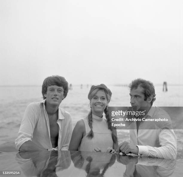 American actress Jane Fonda with her brother Peter Fonda and her husband Roger Vadim portrayed on a water taxi crossing the Canal Grande, Venice,...