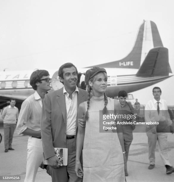 American actress Jane Fonda with Roger Vadim at Lido airport, Venice, 1967.