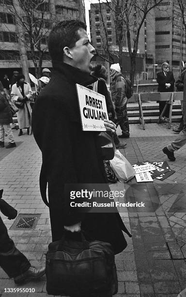 Protester marches for justice on the murder of Amadou Diallo by NYPD at One Police Plaza, New York, New York in 1999.