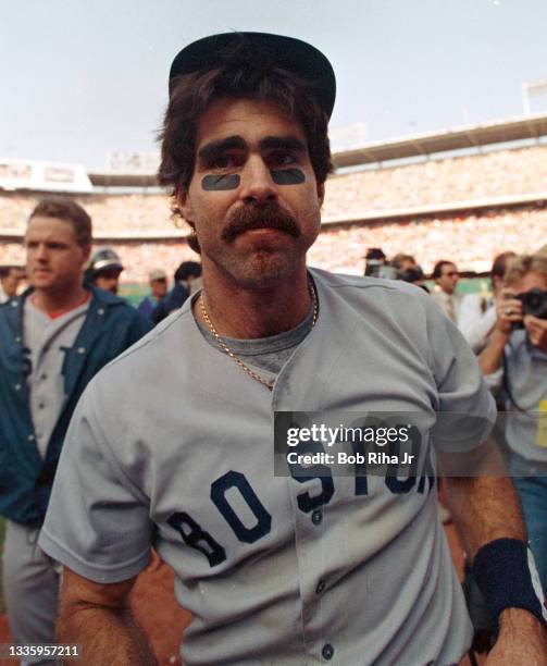 Boston Red Sox Bill Buckner celebrates as he leaves the field after Game 5 during ALCS, October 12, 1986 in Anaheim, California.