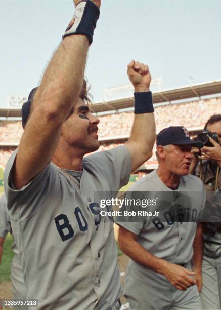 Boston Red Sox Bill Buckner celebrates as he leaves the field after Game 5 during ALCS, October 12, 1986 in Anaheim, California.