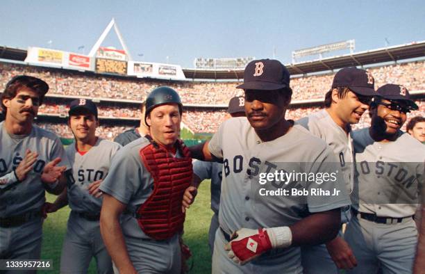 Boston Red Sox Rich Geldman , Don Baylor Dave Henderson celebrate Henderson's home run victory in Game 5 during ALCS, October 12, 1986 in Anaheim,...