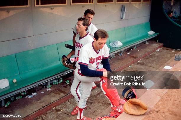 California Angels catcher Jerry Narron and infielder Doug DeCinces pack up and leave the dugout after loosing Game 5 of ALCS, October 12, 1986 in...