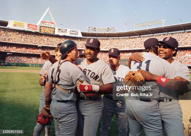 Boston Red Sox Rich Geldman , Don Baylor Dave Henderson celebrate Henderson's home run victory in Game 5 during ALCS, October 12, 1986 in Anaheim,...