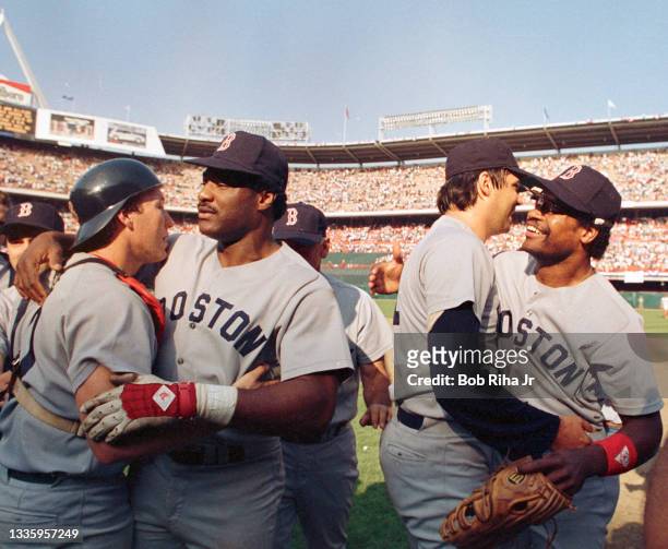 Boston Red Sox Rich Geldman , Don Baylor Dave Henderson celebrate Henderson's home run victory in Game 5 during ALCS, October 12, 1986 in Anaheim,...
