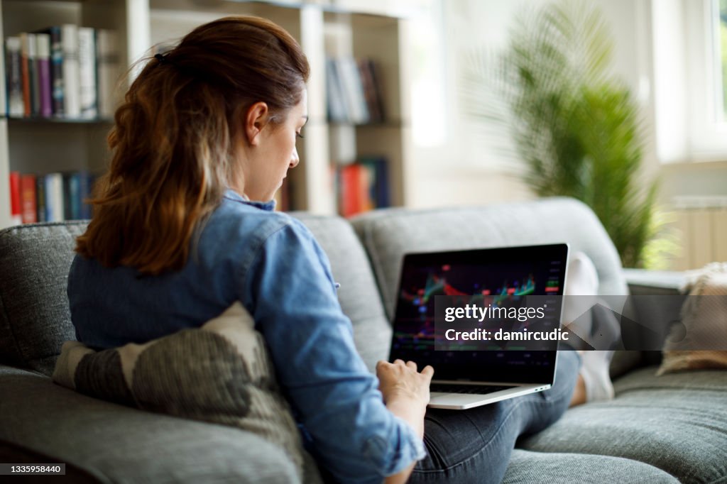 Young woman trading online