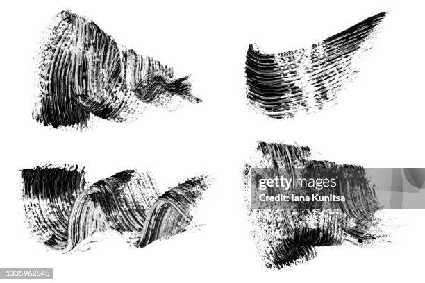 set of different mascara smears on white background isolated. black mascara smudged. banner. closeup. makeup. cosmetic products for eyelashes. template for design. pattern. collection. - wimperntusche stock-fotos und bilder