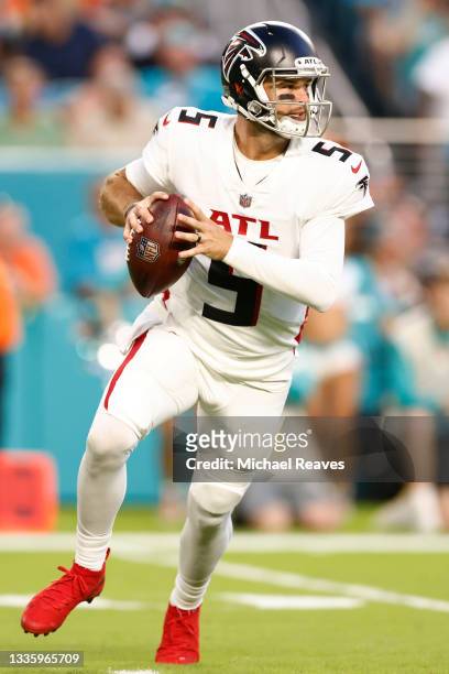 McCarron of the Atlanta Falcons looks to pass against the Miami Dolphins during a preseason game at Hard Rock Stadium on August 21, 2021 in Miami...
