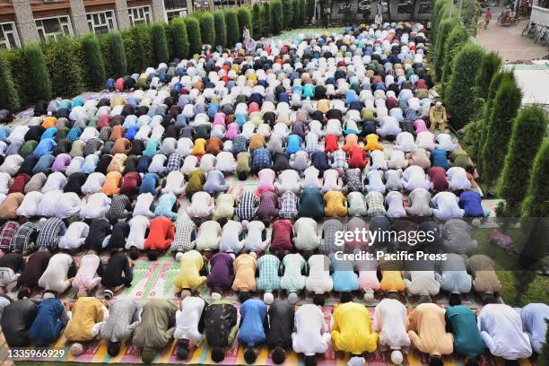 Kashmiri Muslims seen performing Eid al-Adha prayers at Srinagar the Summer capital of Indian Administered Kashmir. Eid al-Adha is one of the two...