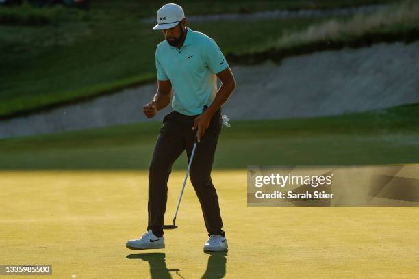 Tony Finau of the United States reacts after putting on the 18th green during the final round of THE NORTHERN TRUST, the first event of the FedExCup...