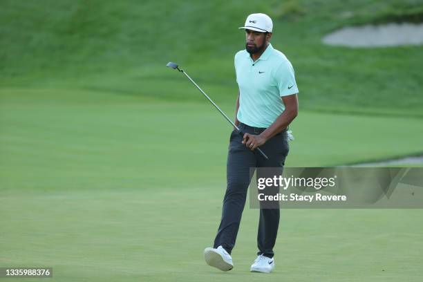 Tony Finau of the United States reacts after putting on the first-playoff 18th hole during the final round of THE NORTHERN TRUST, the first event of...