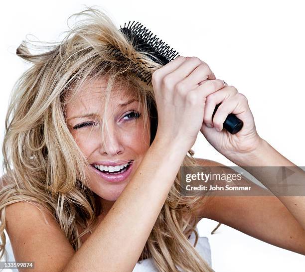 woman having a bad hair day - frizzy stock pictures, royalty-free photos & images