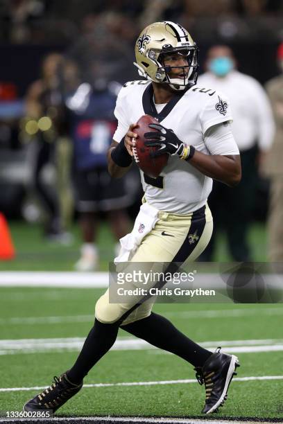Jameis Winston of the New Orleans Saints looks to throw a pass against the Jacksonville Jaguars at Caesars Superdome on August 23, 2021 in New...