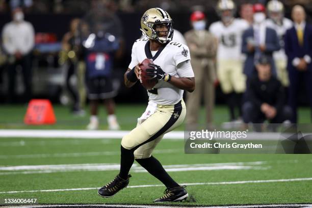 Jameis Winston of the New Orleans Saints looks to throw a pass against the Jacksonville Jaguars at Caesars Superdome on August 23, 2021 in New...