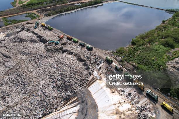 garbage factory at the cityscape - plastic-bag-landfill stock pictures, royalty-free photos & images