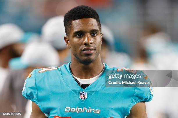 Byron Jones of the Miami Dolphins looks on against the Atlanta Falcons during a preseason game at Hard Rock Stadium on August 21, 2021 in Miami...