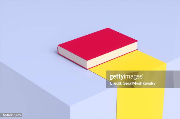 the fake news concept of a red book with which flows a waterfall of yellow information on a purple background. - internet democracy stock pictures, royalty-free photos & images