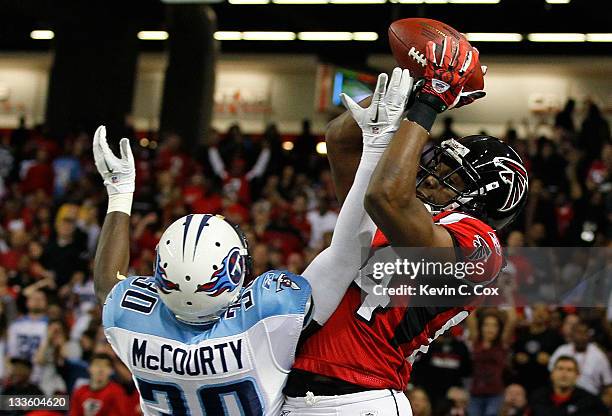 Roddy White of the Atlanta Falcons fails to pull in this touchdown reception inbounds against Jason McCourty of the Tennessee Titans at Georgia Dome...