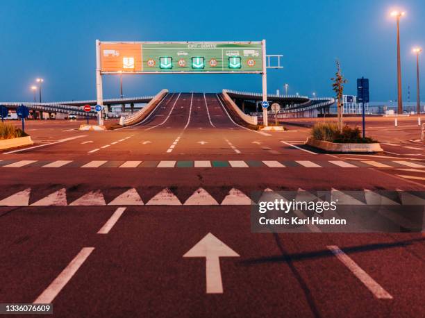 a dusk view of the port of calais, france - stock photo - calais stock pictures, royalty-free photos & images