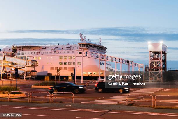 a dusk view of the port of calais, france - stock photo - calais ferry stock pictures, royalty-free photos & images