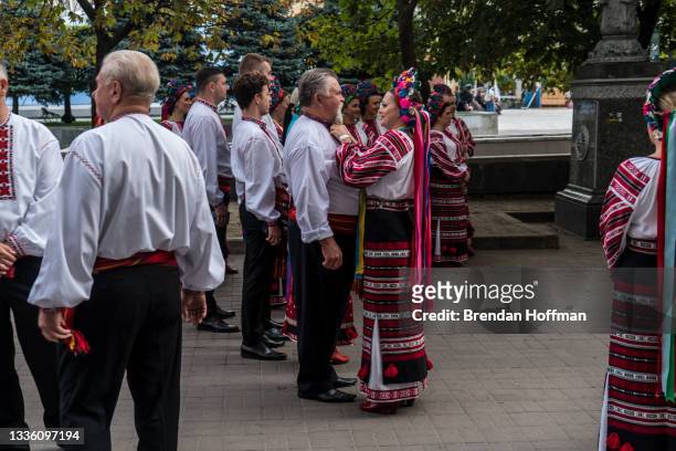 Members of a choir dressed in traditional Ukrainian clothes prepare for an Independence Day parade on August 24, 2021 in Kyiv, Ukraine. Ukraine...