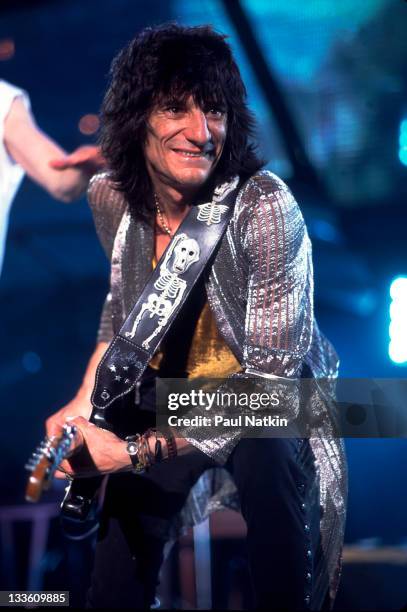 British musician Ron Wood of the Rolling Stones performs on stage during the band's 'Voodoo Lounge' tour, late 1994.